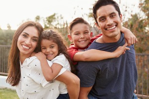 Happy Family Smiling Outside 